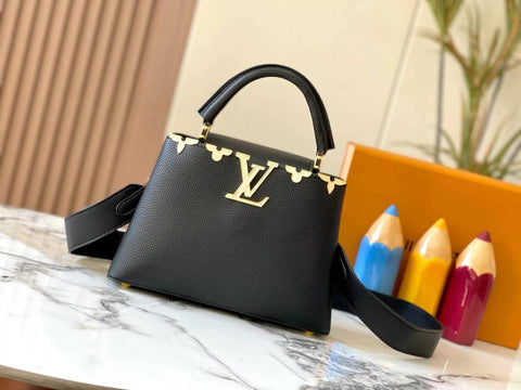 Louis Vuitton Leather and Python Capucines Bag
